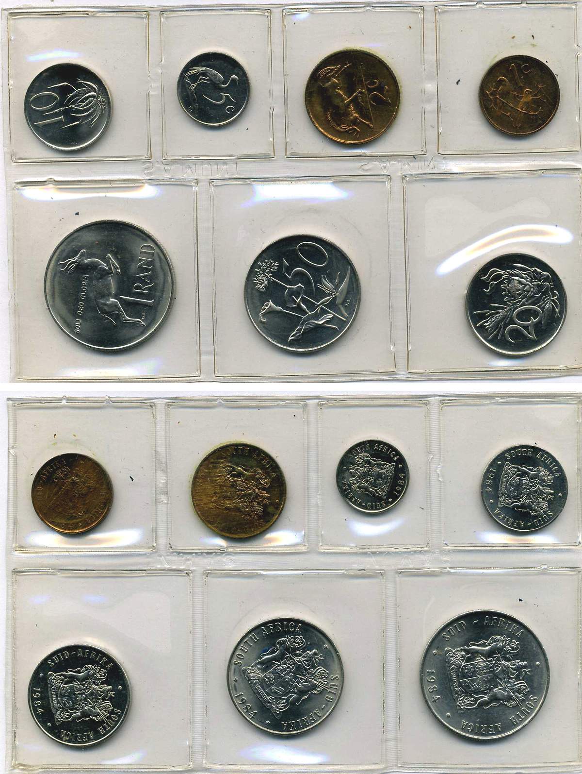 Монеты 1984 года стоимость. Запайка монет. Банковская запайка монет. ЮАР набор монеты 1961 года. Монета 1984.